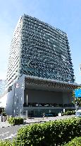 Exterior, logo, and sign of Nissan Motor Co., Ltd.'s Global Headquarters
